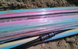 Flat micro-duct bundles in the ground