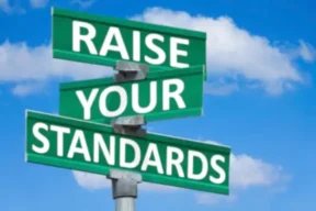 Standards-and-Compliances-scaled drawing showing sky and raise your standards words. all about fiber optic cable and cable blowing machine standards.