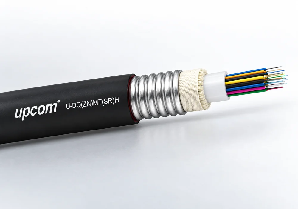 UPCOM armored fiber optic cable showing its jacket, armor and optical fibers